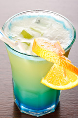 Summer drink decorated with a slice of orange