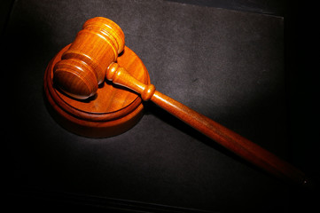 judge's legal gavel on a law book