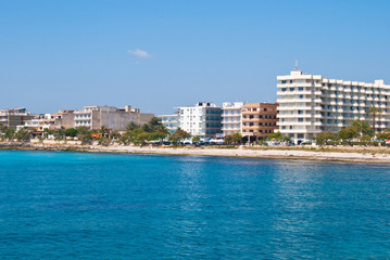 Sa Coma resort town and the beach of Mediterranean Sea