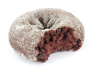 Chocolate sugar sprinkled donut that has been bitten