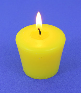 A single lit citronella candle