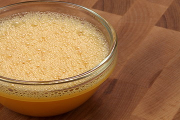 egg beaten in a fancy glass bowl