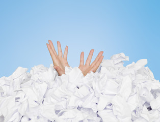 Human buried in papers