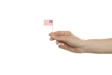Small USA flag in his hand