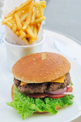 Cheese burger - American cheese burger with fresh salad