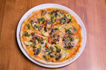 The vegetarian pizza.