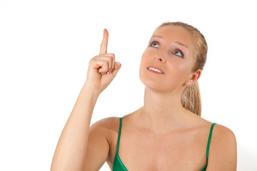 Woman pointing finger with copyspace