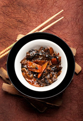 Fried mushrooms with garlic and bamboo. Chinese food