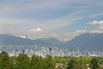 A downtown view with mountain background.