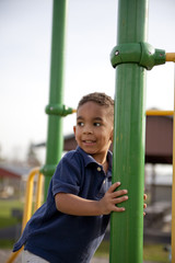 Fototapeta premium Multi-racial boy at the park