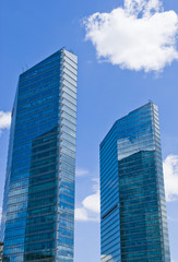 Fototapeta na wymiar High modern skyscrapers on a background of the blue sky