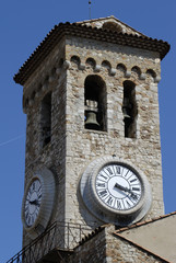 Fototapeta na wymiar Church clock and bell tower. Cannes. Cote d'azur. France