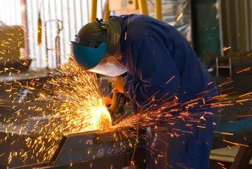 Foto auf Acrylglas Industrial Steel Grinding © John Casey
