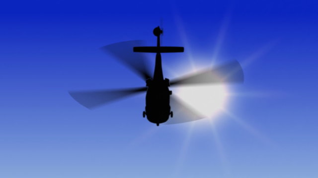 Helicopter flying over ocean