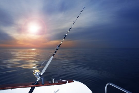 boat fishing sunrise on mediterranean sea ocean