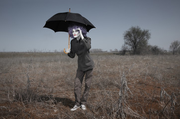 Funny man and umbrella