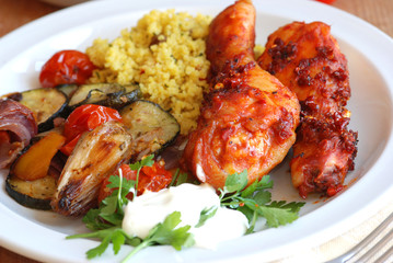 Spicy chicken with couscous and roasted vegetables