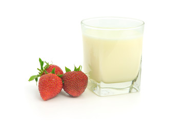 glass of milk and strawberries