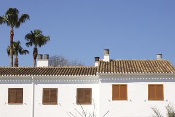 mediterranean white house outdoor detail blue sky