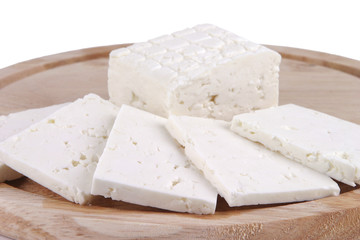 sliced white cheese on plate