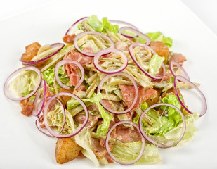 Onion salad of meat with roast vegetables
