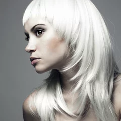 Fototapeten Beautiful young woman with blond hair © Egor Mayer