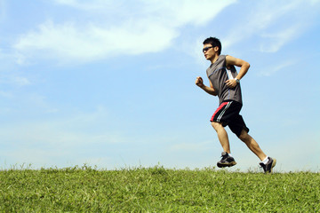 Man running on grass