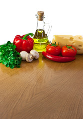 Empty table with ingredients  and place for your dish or pizza