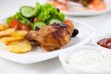 Chicken with roasted potatoes and salad