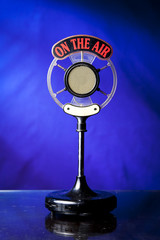 photo of radio microphone on blue background