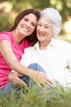 Senior Woman With Adult Daughter In Park