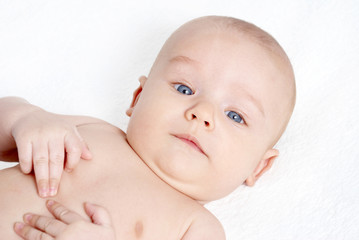 bright portrait of adorable baby over white