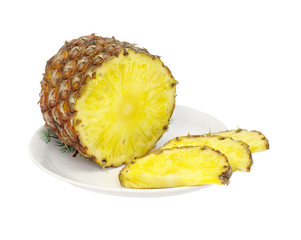 cut ananas on plate