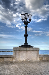 Characteristic lamppost on Bari seafront. Apulia.