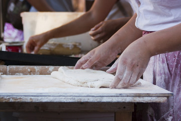 Pasta making hands