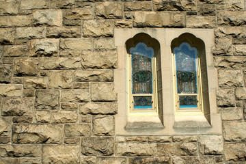 Stone wall with stained glass windows