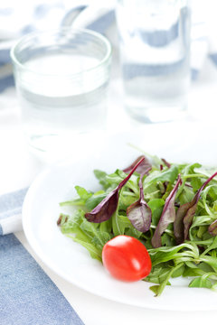 Fresh salad and water