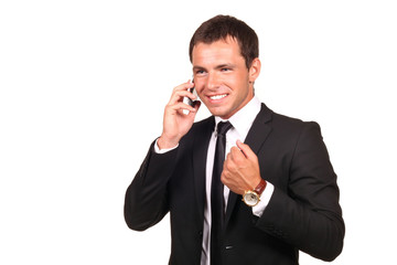 Portrait of a young business man on cell phone