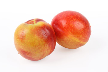 Fototapeta na wymiar two peaches