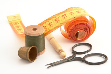 Collection of sewing tools and supplies in a sewing kit