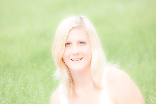 Beautiful young woman with  deliberate soft dreamy feel to image