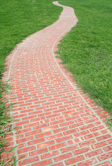 Curved red brick walkway