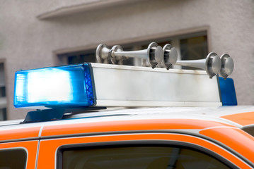 roof of a german emergency car with blue light