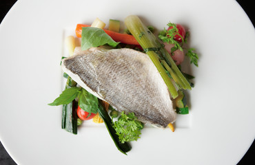 Boiled seabass with steamed vegetables