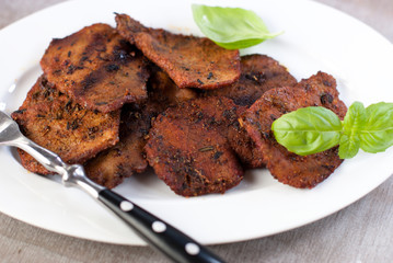 Marinated pork pierrade with herbs