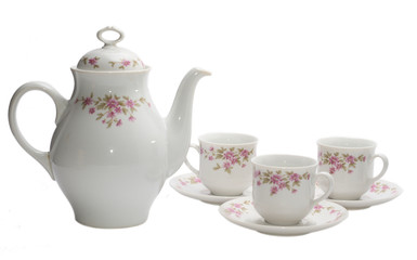 coffee-pot and three cups of coffee isolated on white.