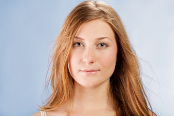 Portrait of a pretty red-haired young woman