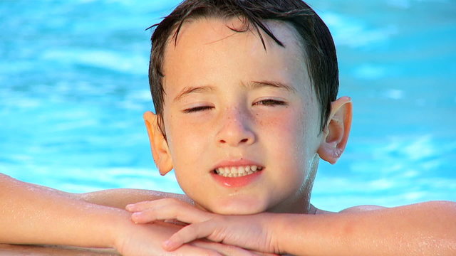 Young Boy in Family Swimming Pool  60FPS