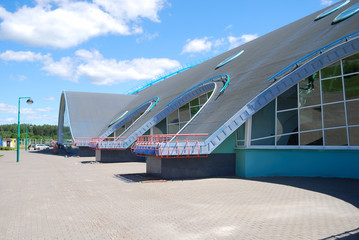Modern sports complex against the blue sky
