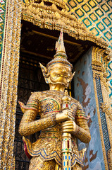 Fototapeta premium The Golden Statue in The Grand Palace Bangkok, Thailand